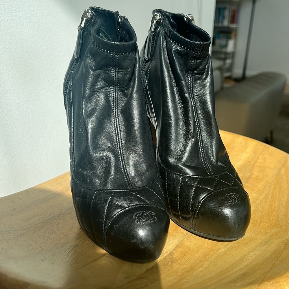 CHANEL black leather quilted logo high heel ankle booties